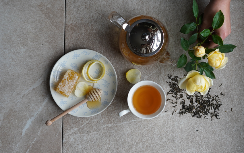 Flat lay image of a rose bred by David Austin, with visual fragrance notes