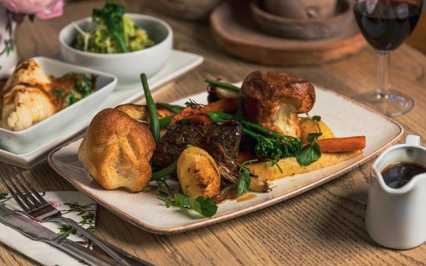 Close up shot of a sunday dinner at David Austin roses