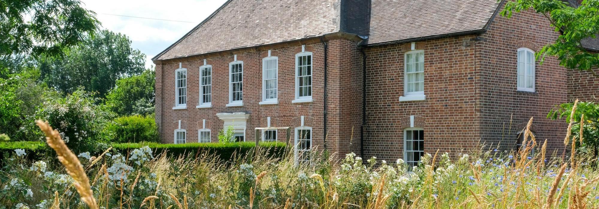 David Austin's house in Shropshire with Kew Garden's in a meadow.